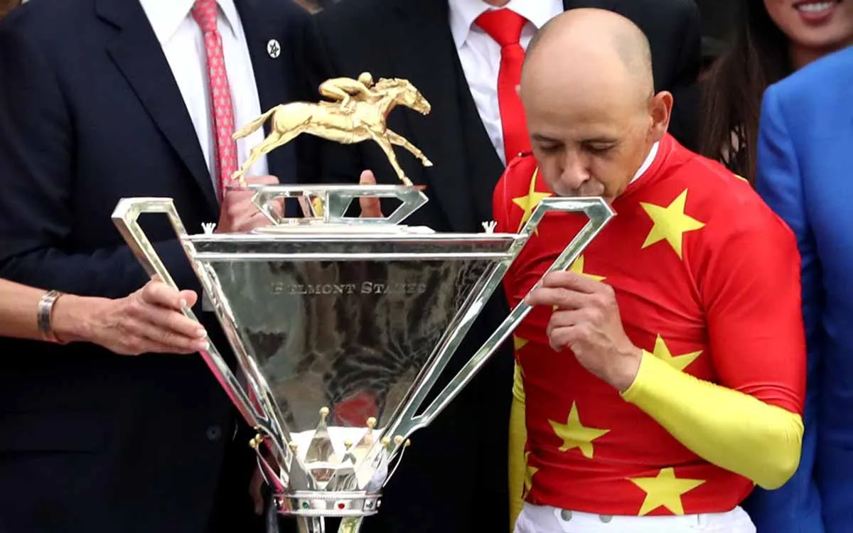 Jockey-Mike-Smith-Triple-Crown-Trophy-GettyImages.webp