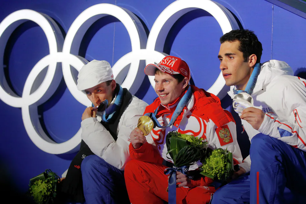 Павол_Хурайт_Евгений_Устюгов_Мартин_Фуркад_ОИ_2010_Фото_РИА_Новости.webp