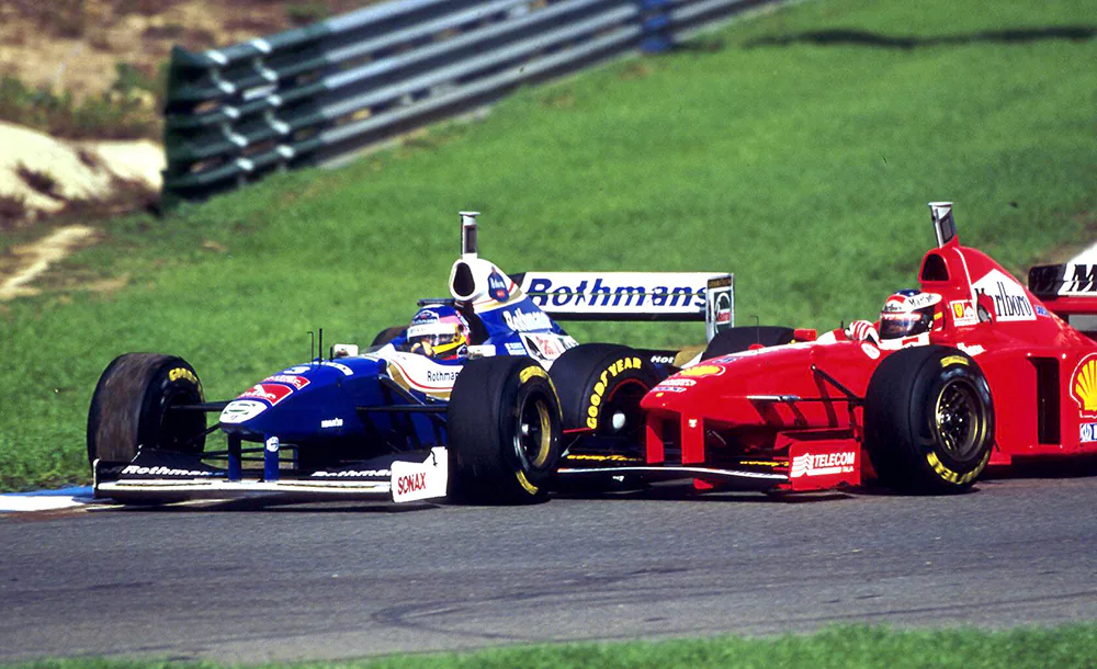 Жак_Вильнев_Михаэль_Шумахер_Херес_1997_Фото_Sutton_Motor_Sport_Images.webp