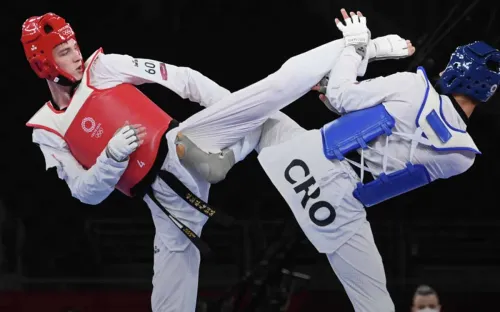 Стал олимпийским чемпионом со сломанной рукой. Он дрался до конца ради умершей матери